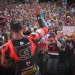 petrucci waving to fans