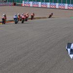 David Muñoz takes flag