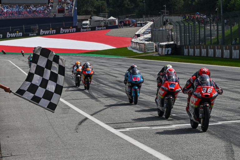Angel Piqueras taking the flag