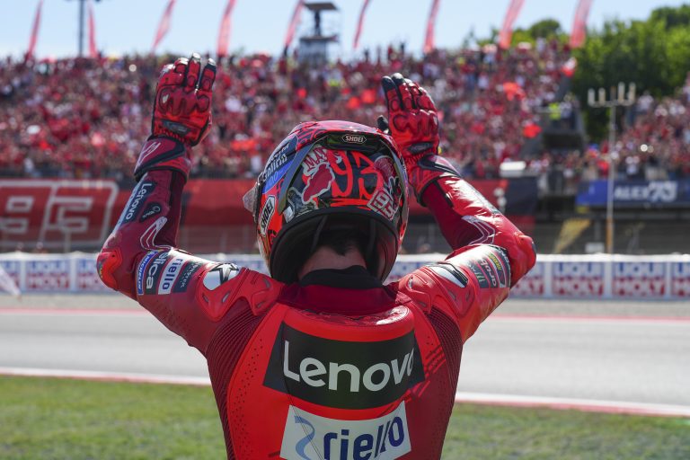 marc waving to fans both hands