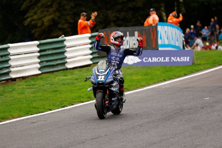 skinner celebrates top of mountain